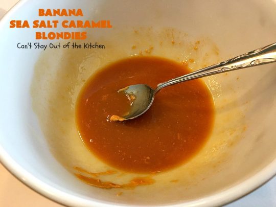 Banana Sea Salt Caramel Blondies | Can't Stay Out of the Kitchen | these amazing #brownies have triple the #caramel flavor with caramel chips in the cookie, icing and caramel sauce drizzled over top! Perfect #dessert for potlucks, #tailgating parties, summer #holiday fun or backyard #BBQs. #cookies #bananas