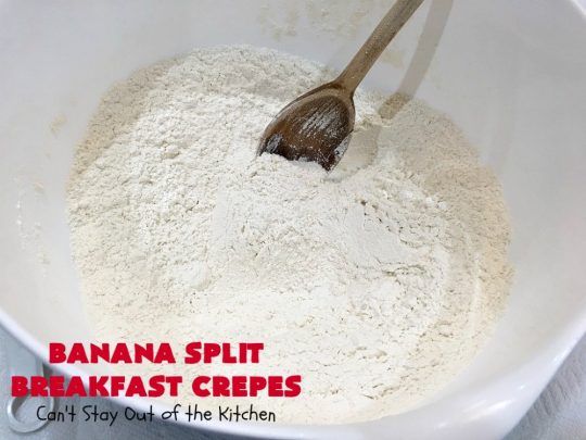 Banana Split Breakfast Crêpes | Can't Stay Out of the Kitchen | these spectacular #breakfast #crêpes will rock your world! They're filling with a #pineapple filling & sliced #bananas. Then garnished with #walnuts, bananas #MaraschinoCherries & whipped cream. Perfect for a company or #holiday breakfast. #BreakfastCrêpes #BananaSplit #BananaSplitBreakfastCrêpes
