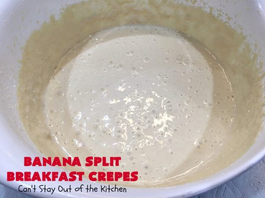 Banana Split Breakfast Crêpes | Can't Stay Out of the Kitchen | these spectacular #breakfast #crêpes will rock your world! They're filling with a #pineapple filling & sliced #bananas. Then garnished with #walnuts, bananas #MaraschinoCherries & whipped cream. Perfect for a company or #holiday breakfast. #BreakfastCrêpes #BananaSplit #BananaSplitBreakfastCrêpes