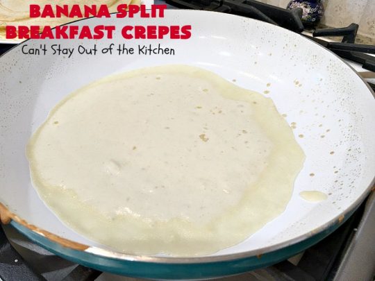 Banana Split Breakfast Crêpes | Can't Stay Out of the Kitchen | these spectacular #breakfast #crêpes will rock your world! They're filling with a #pineapple filling & sliced #bananas. Then garnished with #walnuts, bananas #MaraschinoCherries & whipped cream. Perfect for a company or #holiday breakfast. #BreakfastCrêpes #BananaSplit #BananaSplitBreakfastCrêpes