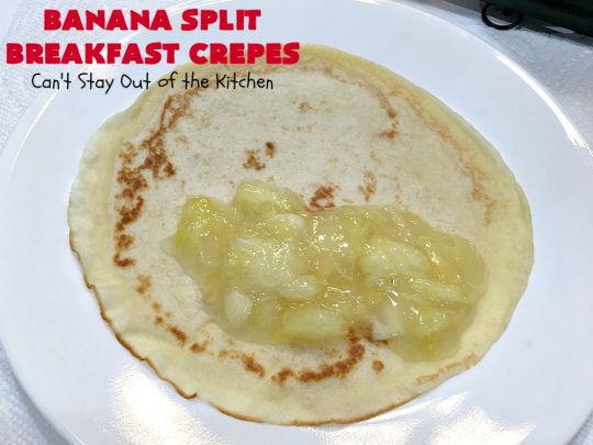 Banana Split Breakfast Crêpes | Can't Stay Out of the Kitchen | these spectacular #breakfast #crêpes will rock your world! They're filling with a #pineapple filling & sliced #bananas. Then garnished with #walnuts, bananas #MaraschinoCherries & whipped cream. Perfect for a company or #holiday breakfast. #BreakfastCrêpes #BananaSplit #BananaSplitBreakfastCrêpes
