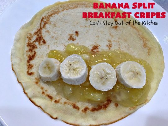 Banana Split Breakfast Crêpes | Can't Stay Out of the Kitchen | these spectacular #breakfast #crêpes will rock your world! They're filling with a #pineapple filling & sliced #bananas. Then garnished with #walnuts, bananas #MaraschinoCherries & whipped cream. Perfect for a company or #holiday breakfast. #BreakfastCrêpes #BananaSplit #BananaSplitBreakfastCrêpes