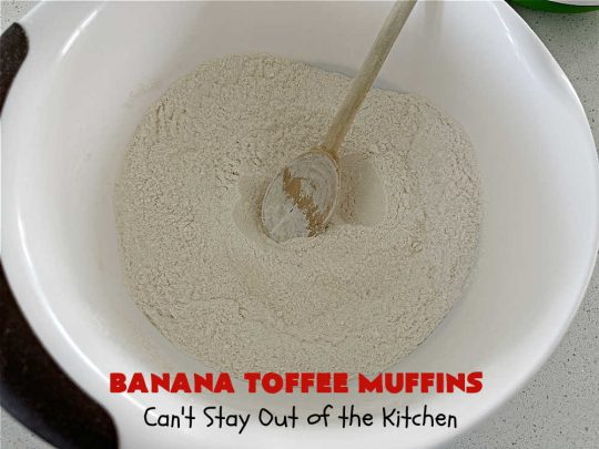 Banana Toffee Muffins | Can't Stay Out of the Kitchen | These outrageous #muffins include #bananas, #applesauce & #HeathEnglishToffeeBits for an explosion of flavor your family & friends will love. Perfect for family, company or a #holiday #breakfast or #brunch. Great snacks for #tailgating parties too. #toffee #BananaMuffins #BananaToffeeMuffins
