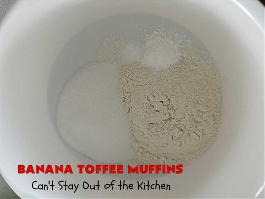 Banana Toffee Muffins | Can't Stay Out of the Kitchen | These outrageous #muffins include #bananas, #applesauce & #HeathEnglishToffeeBits for an explosion of flavor your family & friends will love. Perfect for family, company or a #holiday #breakfast or #brunch. Great snacks for #tailgating parties too. #toffee #BananaMuffins #BananaToffeeMuffins