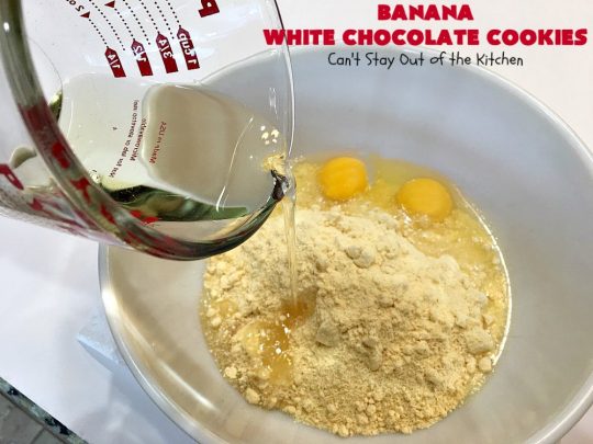 Banana White Chocolate Cookies | Can't Stay Out of the Kitchen | these 4-ingredient #cookies are irresistible. Plus, they can be whipped up in under 30 minutes! Perfect #dessert for #holiday parties and #ChristmasCookieExchanges when you're busy & short on time. #tailgating #bananas #CakeMixCookies #chocolate #baking #BananaDessert #WhiteChocolateChips #ChocolateDessert