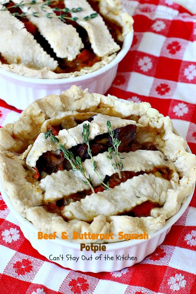 Beef and Butternut Squash Potpie | Can't Stay Out of the Kitchen | these #potpies are amazing. #Steak, apples & #butternutsquash are added to lots of veggies and seasoned with just a hint of cinnamon, nutmegs & cloves. Our company loved these #beef potpies. 
