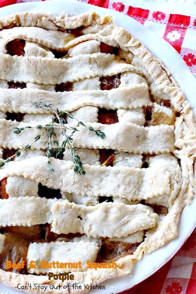 Beef and Butternut Squash Potpie | Can't Stay Out of the Kitchen | these #potpies are amazing. #Steak, apples & #butternutsquash are added to lots of veggies and seasoned with just a hint of cinnamon, nutmegs & cloves. Our company loved these #beef potpies. 