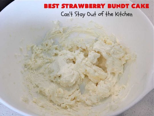 Best Strawberry Bundt Cake | Can't Stay Out of the Kitchen | This is a better version that #NothingBundtCakes that will wow your friends and knock your socks off! This delectable #cake is rich, decadent & heavenly. It's made with #Strawberry cake mix, strawberry jello & #StrawberryPieFilling. The #CreamCheese icing is luscious & irresistible! #StrawberryBundtCake #dessert #StrawberryDessert #holiday #HolidayDessert #BestStrawberryBundtCake