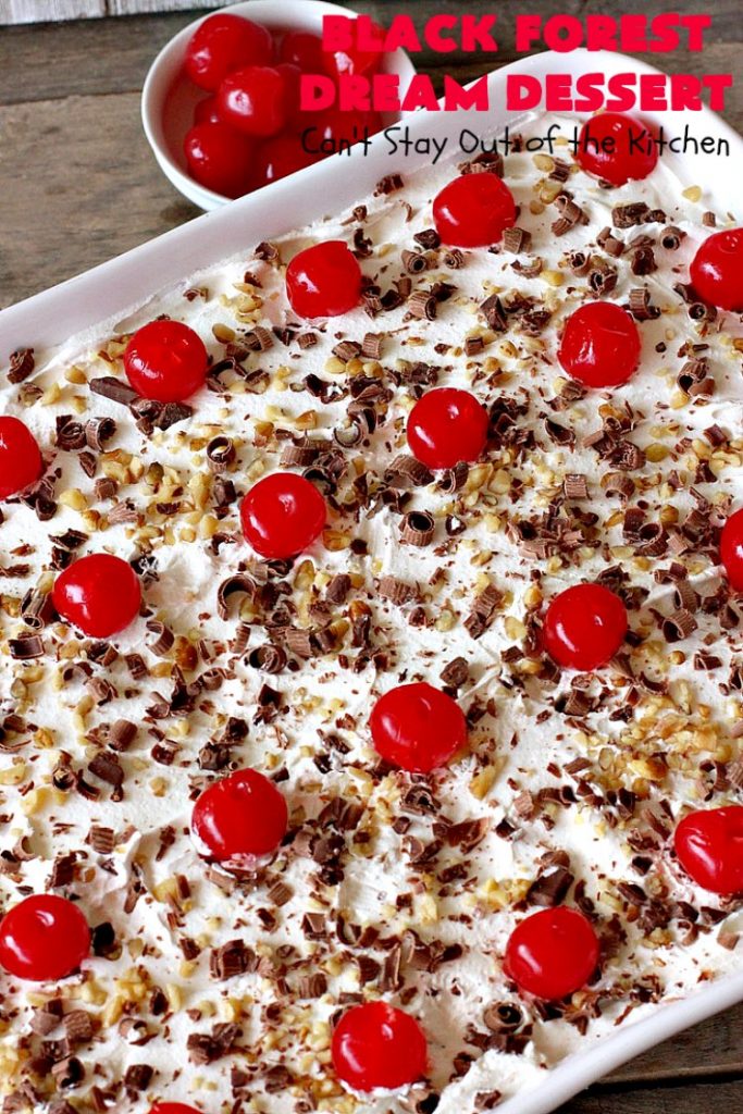 Black Forest Dream Dessert | Can't Stay Out of the Kitchen | this spectacular #dessert has a crust layer with #pecans & #coconut. It also has #cheesecake layer, a #cherrypiefilling layer, a vanilla pudding layer with melted #chocolatechips added, & a top layer with #CoolWhip, #maraschinocherries, #chocolate curls & chopped #pecans. Absolutely divine! #BlackForestDessert #CherryDessert #ChocolateDessert #ValentinesDay #ValentinesDayDessert #ChristmasDessert #CheesecakeDessert