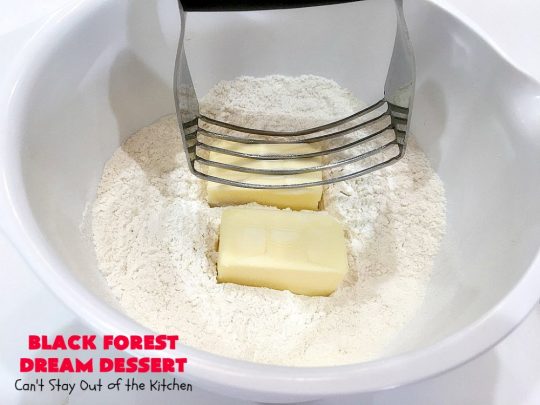 Black Forest Dream Dessert | Can't Stay Out of the Kitchen | this spectacular #dessert has a crust layer with #pecans & #coconut. It also has #cheesecake layer, a #cherrypiefilling layer, a vanilla pudding layer with melted #chocolatechips added, & a top layer with #CoolWhip, #maraschinocherries, #chocolate curls & chopped #pecans. Absolutely divine! #BlackForestDessert #CherryDessert #ChocolateDessert #ValentinesDay #ValentinesDayDessert #ChristmasDessert #CheesecakeDessert