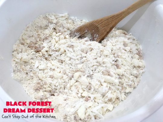 Black Forest Dream Dessert | Can't Stay Out of the Kitchen | this spectacular #dessert has a crust layer with #pecans & #coconut. It also has #cheesecake layer, a #cherrypiefilling layer, a vanilla pudding layer with melted #chocolatechips added, & a top layer with #CoolWhip, #maraschinocherries, #chocolate curls & chopped #pecans. Absolutely divine! #BlackForestDessert #CherryDessert #ChocolateDessert #ValentinesDay #ValentinesDayDessert #ChristmasDessert #CheesecakeDessert