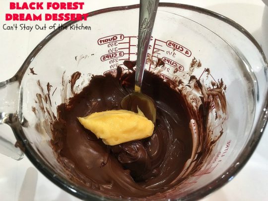 Black Forest Dream Dessert | Can't Stay Out of the Kitchen | this spectacular #dessert has a crust layer with #pecans & #coconut. It also has #cheesecake layer, a #cherrypiefilling layer, a vanilla pudding layer with melted #chocolatechips added, & a top layer with #CoolWhip, #maraschinocherries, #chocolate curls & chopped #pecans. Absolutely divine! #BlackForestDessert #CherryDessert #ChocolateDessert #ValentinesDay #ValentinesDayDessert #ChristmasDessert #CheesecakeDessert