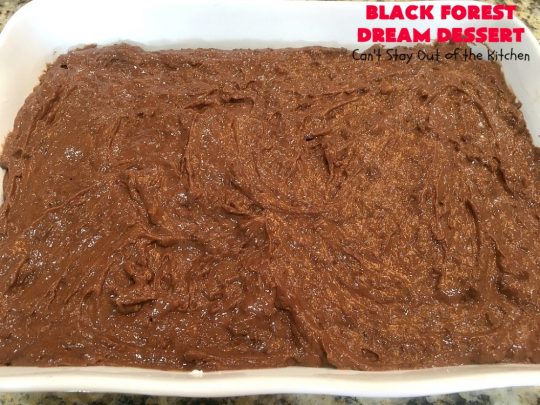 Black Forest Dream Dessert | Can't Stay Out of the Kitchen | this spectacular #dessert has a crust layer with #pecans & #coconut. It also has #cheesecake layer, a #cherrypiefilling layer, a vanilla pudding layer with melted #chocolatechips added, & a top layer with #CoolWhip, #maraschinocherries, #chocolate curls & chopped #pecans. Absolutely divine! #BlackForestDessert #CherryDessert #ChocolateDessert #ValentinesDay #ValentinesDayDessert #ChristmasDessert #CheesecakeDessert