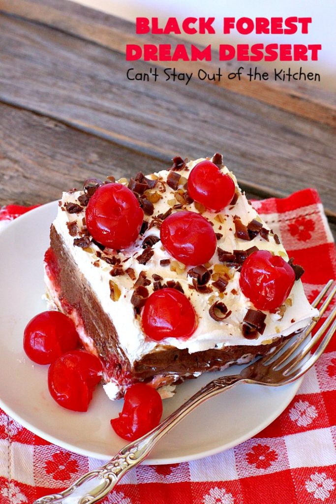 Black Forest Dream Dessert | Can't Stay Out of the Kitchen | this spectacular #dessert has a crust layer with #pecans & #coconut. It also has #cheesecake layer, a #cherrypiefilling layer, a vanilla pudding layer with melted #chocolatechips added, & a top layer with #CoolWhip, #maraschinocherries, #chocolate curls & chopped #pecans. Absolutely divine! #BlackForestDessert #CherryDessert #ChocolateDessert #ValentinesDay #ValentinesDayDessert #ChristmasDessert #CheesecakeDessert