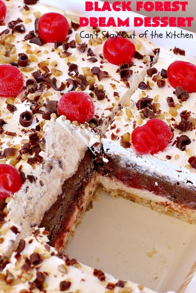 Black Forest Dream Dessert | Can't Stay Out of the Kitchen | this spectacular #dessert has a crust layer with #pecans & #coconut. It also has #cheesecake layer, a #cherrypiefilling layer, a vanilla pudding layer with melted #chocolatechips added, & a top layer with #CoolWhip, #maraschinocherries, #chocolate curls & chopped #pecans. Absolutely divine! #BlackForestDessert #CherryDessert #ChocolateDessert #ValentinesDay #ValentinesDayDessert #ChristmasDessert #CheesecakeDessert