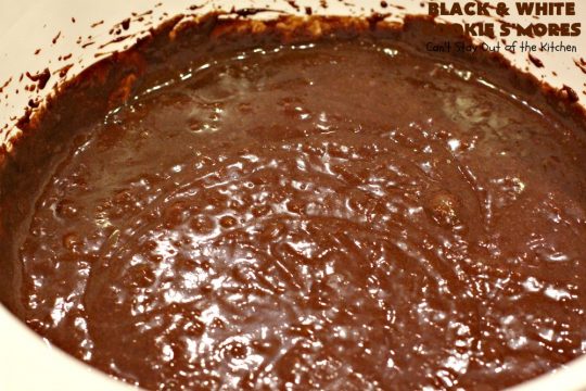 Black and White Cookie S'Mores | Can't Stay Out of the Kitchen | this fantastic #PaulaDeen #recipe includes #chocolate bars, #GrahamCrackers and #WhiteChocolateChips in the #cookie. Each one is put together with #MarshmallowCreme. These are the ultimate in #SmoresCookie! Great for #holiday #baking & #ChristmasCookieExchanges too. #Smores #dessert #SmoresDessert #BlackAndWhiteCookieSMores