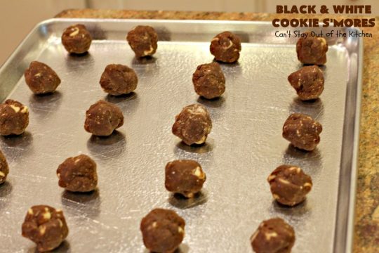 Black and White Cookie S'Mores | Can't Stay Out of the Kitchen | this fantastic #PaulaDeen #recipe includes #chocolate bars, #GrahamCrackers and #WhiteChocolateChips in the #cookie. Each one is put together with #MarshmallowCreme. These are the ultimate in #SmoresCookie! Great for #holiday #baking & #ChristmasCookieExchanges too. #Smores #dessert #SmoresDessert #BlackAndWhiteCookieSMores