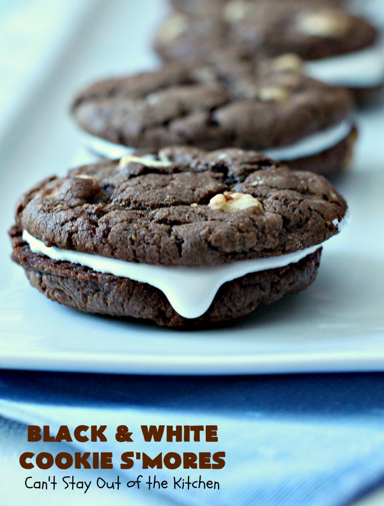 Black and White Cookie S'Mores | Can't Stay Out of the Kitchen | this fantastic #PaulaDeen #recipe includes #chocolate bars, #GrahamCrackers and #WhiteChocolateChips in the #cookie. Each one is put together with #MarshmallowCreme. These are the ultimate in #SmoresCookie! Great for #holiday #baking & #ChristmasCookieExchanges too. #Smores #dessert #SmoresDessert #BlackAndWhiteCookieSMores