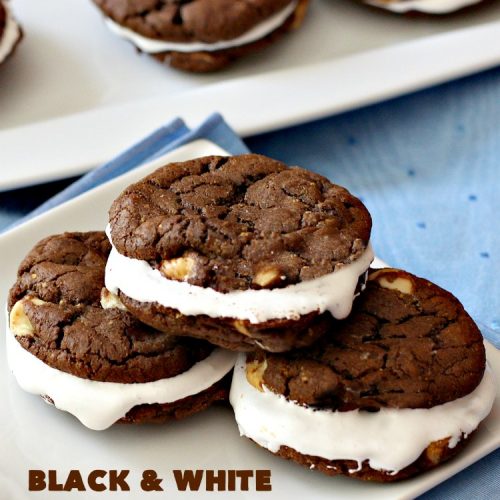 Black and White Cookie S'Mores | Can't Stay Out of the Kitchen | this fantastic #PaulaDeen #recipe includes #chocolate bars, #GrahamCrackers and #WhiteChocolateChips in the #cookie. Each one is put together with #MarshmallowCreme. These are the ultimate in #SmoresCookie! Great for #holiday #baking & #ChristmasCookieExchanges too. #Smores #dessert #SmoresDessert #BlackAndWhiteCookieSMores