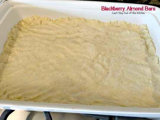 Blackberry Almond Bars | Can't Stay Out of the Kitchen | Your family will rave over these ooey, gooey delicious #dessert bars. The shortbread crust is topped with #blackberry filling and sliced #almonds. Delightful for #holiday baking. #cookie