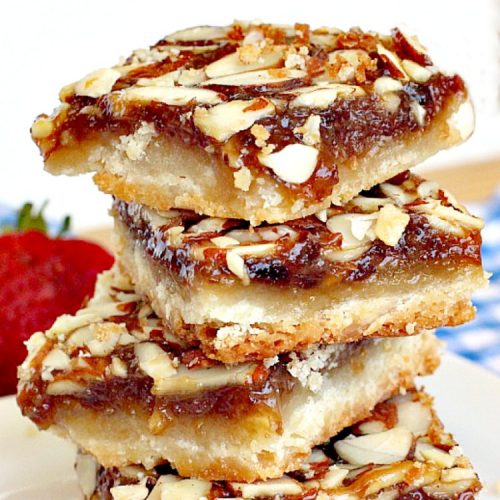 Blackberry Almond Bars | Can't Stay Out of the Kitchen | Your family will rave over these ooey, gooey delicious #dessert bars. The shortbread crust is topped with #blackberry filling and sliced #almonds. Delightful for #holiday baking. #cookie