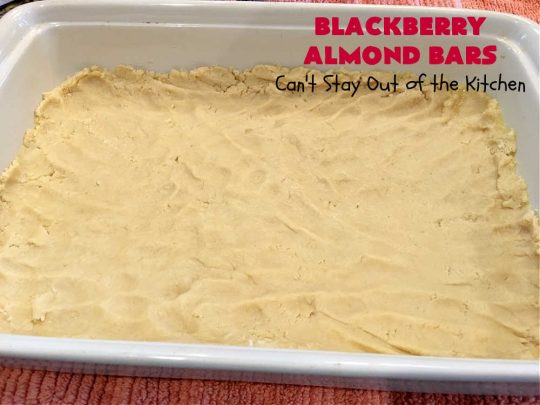 Blackberry Almond Bars | Can't Stay Out of the Kitchen | Your family will rave over these ooey, gooey delicious #dessert bars. The shortbread crust is topped with #blackberry filling and sliced #almonds. They're absolutely divine! Delightful for #tailgating parties, potlucks, backyard BBQs & #holiday baking. # #BlackberryDessert #BlackberryAlmondBars