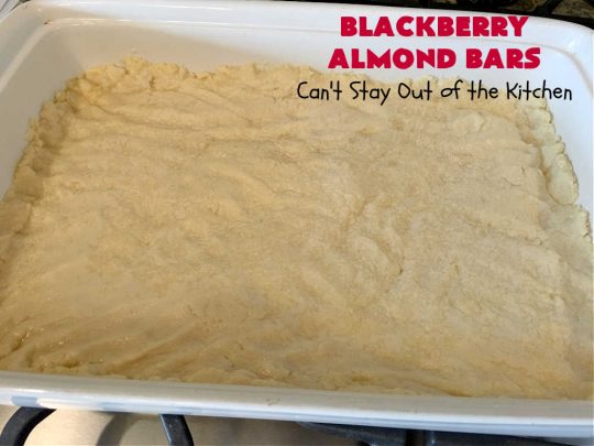 Blackberry Almond Bars | Can't Stay Out of the Kitchen | Your family will rave over these ooey, gooey delicious #dessert bars. The shortbread crust is topped with #blackberry filling and sliced #almonds. They're absolutely divine! Delightful for #tailgating parties, potlucks, backyard BBQs & #holiday baking. # #BlackberryDessert #BlackberryAlmondBars