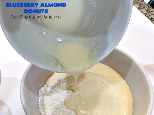 Blueberry Almond Donuts | Can't Stay Out of the Kitchen | these fabulous #blueberry #donuts include #almond extract in both the donut and the icing. They are outrageously delicious! I've made these 3 times & everyone always loves them. #blueberries #BlueberryDonuts #breakfast #Holiday #HolidayBreakfast 