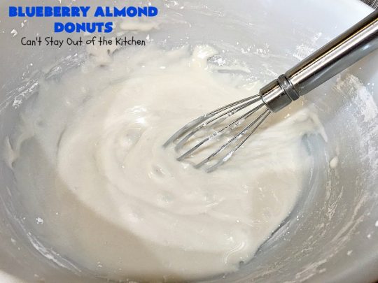Blueberry Almond Donuts | Can't Stay Out of the Kitchen | these fabulous #blueberry #donuts include #almond extract in both the donut and the icing. They are outrageously delicious! I've made these 3 times & everyone always loves them. #blueberries #BlueberryDonuts #breakfast #Holiday #HolidayBreakfast 