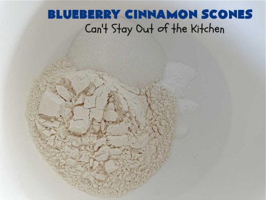 Blueberry Cinnamon Scones | Can't Stay Out of the Kitchen | these #scones are absolutely delightful.. They have a soft, almost bread-like texture & they're filled with #blueberries, baked with a #CinnamonSugar topping & iced with a powdered sugar glaze. They're fantastic for weekend, company or a #holiday #breakfast. Every bite will have you swooning! #BlueberryCinnamonScones