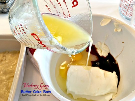Blueberry Gooey Butter Cake Bars | Can't Stay Out of the Kitchen | you will drool over every bite of these fantastic #brownies. They are ooey, gooey and delicious with a great twist by using #blueberries. #dessert #cookies