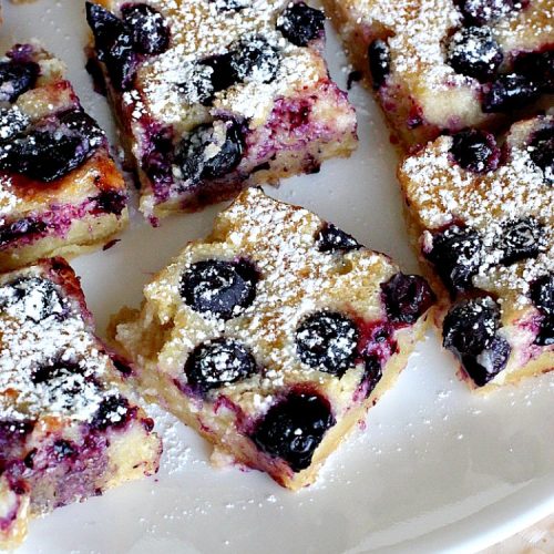 Blueberry Gooey Butter Cake Bars | Can't Stay Out of the Kitchen | you will drool over every bite of these fantastic #brownies. They are ooey, gooey and delicious with a great twist by using #blueberries. #dessert #cookies
