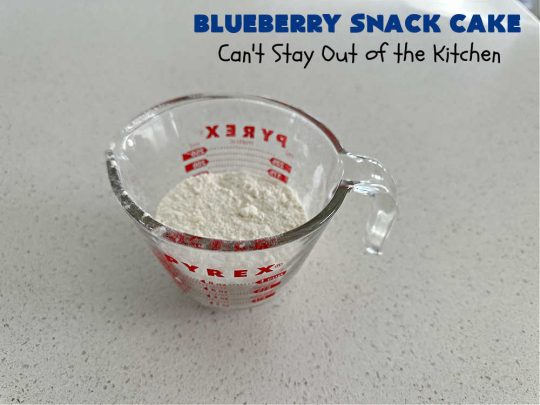 Blueberry Snack Cake | Can't Stay Out of the Kitchen | this lovely 7-ingredient #dessert is light & refreshing. It's filled with #blueberries & can be whipped up & on the table in 45 minutes. It's perfect for picnics, potlucks, backyard BBQs, or even #tailgating parties. #cake #BlueberryDessert #BlueberrySnackCake