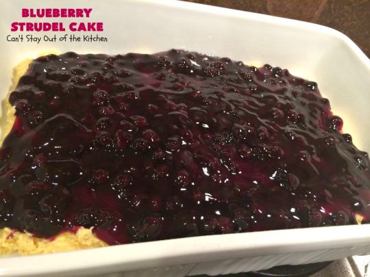 Blueberry Strudel Cake | Can't Stay Out of the Kitchen | this spectacular #cake is divine! The crust layer is made with a boxed #cakemix. It's topped with #Blueberrypiefilling, a streusel layer & glazed with an #almond flavored icing. Terrific #dessert for #Easter or #MothersDay. #BlueberryStrudelCake #BlueberryCake #BlueberryDessert #Coffeecake #breakfast #HolidayBreakfast #BlueberryCoffeecake