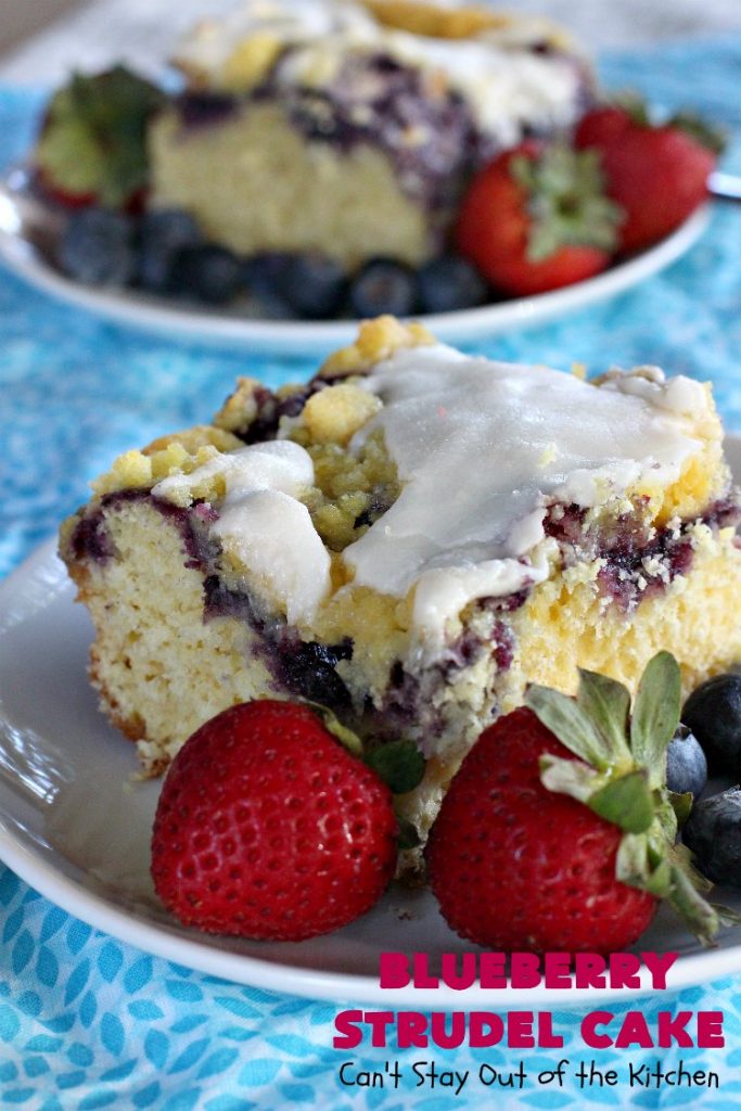 Blueberry Strudel Cake | Can't Stay Out of the Kitchen | this spectacular #cake is divine! The crust layer is made with a boxed #cakemix. It's topped with #Blueberrypiefilling, a streusel layer & glazed with an #almond flavored icing. Terrific #dessert for #Easter or #MothersDay. #BlueberryStrudelCake #BlueberryCake #BlueberryDessert #Coffeecake #breakfast #HolidayBreakfast #BlueberryCoffeecake