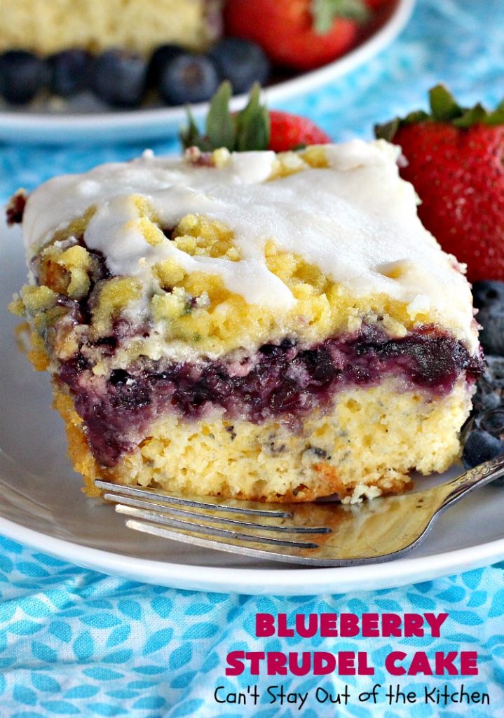 Blueberry Strudel Cake | Can't Stay Out of the Kitchen | this spectacular #cake is divine! The crust layer is made with a boxed #cakemix. It's topped with #Blueberrypiefilling, a streusel layer & glazed with an #almond flavored icing. Terrific #dessert for #Easter or #MothersDay. #BlueberryStrudelCake #BlueberryCake #BlueberryDessert #Coffeecake #breakfast #HolidayBreakfast #BlueberryCoffeecake