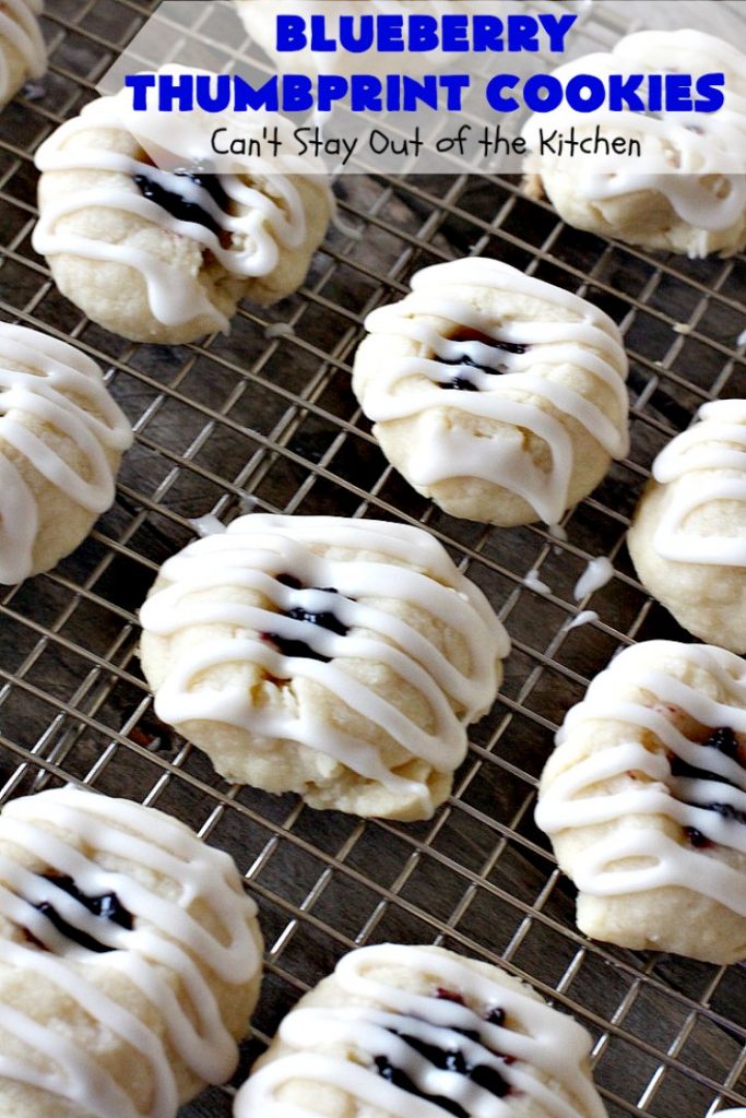 Blueberry Thumbprint Cookies | Can't Stay Out of the Kitchen | these festive & beautiful #Christmas #cookies will have you salivating after the first bite. Perfect for #holiday parties like Christmas & #NewYearsDay. #dessert #blueberries #cookies #HolidayDessert #BlueberryDessert #ChristmasCookieExchange #ChristmasCookie