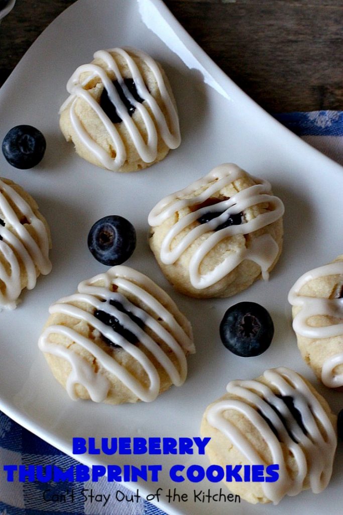 Blueberry Thumbprint Cookies | Can't Stay Out of the Kitchen | these festive & beautiful #Christmas #cookies will have you salivating after the first bite. Perfect for #holiday parties like Christmas & #NewYearsDay. #dessert #blueberries #cookies #HolidayDessert #BlueberryDessert #ChristmasCookieExchange #ChristmasCookie
