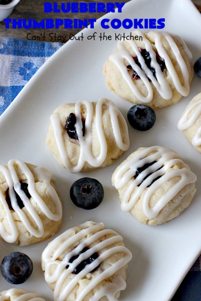 Blueberry Thumbprint Cookies | Can't Stay Out of the Kitchen | these festive & beautiful #Christmas #cookies will have you salivating after the first bite. Perfect for #holiday parties like Christmas & #NewYearsDay. #dessert #blueberries #cookies #HolidayDessert #BlueberryDessert #ChristmasCookieExchange #ChristmasCookie