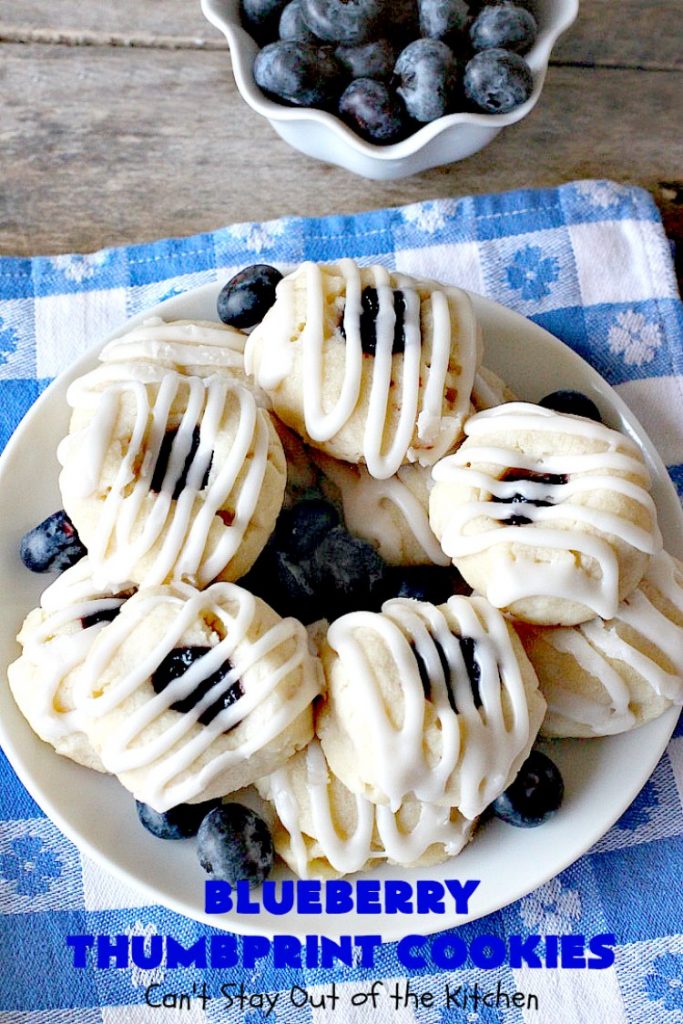 Blueberry Thumbprint Cookies | Can't Stay Out of the Kitchen | these festive & beautiful #Christmas #cookies will have you salivating after the first bite. Perfect for #holiday parties like Christmas & #NewYearsDay. #dessert #blueberries #cookies #HolidayDessert #BlueberryDessert #ChristmasCookieExchange #ChristmasCookie