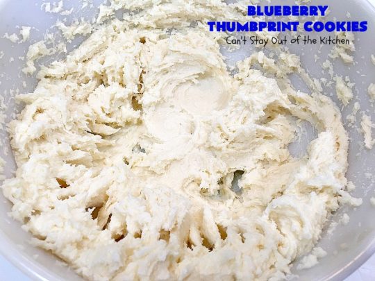 Blueberry Thumbprint Cookies | Can't Stay Out of the Kitchen | these festive & beautiful #Christmas #cookies will have you salivating after the first bite. Perfect for #holiday parties like Christmas & #NewYearsDay. #dessert #blueberries #cookies #HolidayDessert #BlueberryDessert #ChristmasCookieExchange #ChristmasCookie