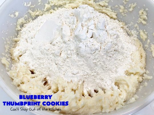 Blueberry Thumbprint Cookies | Can't Stay Out of the Kitchen | these festive & beautiful #Christmas #cookies will have you salivating after the first bite. Perfect for #holiday parties like Christmas & #NewYearsDay. #dessert #blueberries #cookies #HolidayDessert #BlueberryDessert #ChristmasCookieExchange #ChristmasCookie