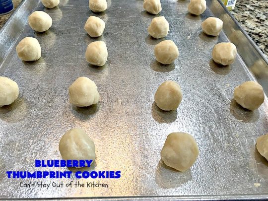 Blueberry Thumbprint Cookies | Can't Stay Out of the Kitchen | these festive & beautiful #Christmas #cookies will have you salivating after the first bite. Perfect for #holiday parties like Christmas & #NewYearsDay. #dessert #blueberries #cookies #HolidayDessert #BlueberryDessert #ChristmasCookieExchange #ChristmasCookie