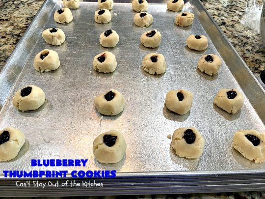 Blueberry Thumbprint Cookies | Can't Stay Out of the Kitchen | these festive & beautiful #Christmas #cookies will have you salivating after the first bite. Perfect for #holiday parties like Christmas & #NewYearsDay. #dessert #blueberries #cookies #HolidayDessert #BlueberryDessert #ChristmasCookieExchange #ChristmasCookie