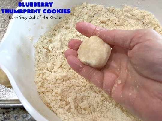 Blueberry Thumbprint Cookies | Can't Stay Out of the Kitchen | these festive & beautiful #Christmas #cookies will have you salivating after the first bite. Perfect for #holiday parties like Christmas & #NewYearsDay. #dessert #blueberries #cookies #HolidayDessert #BlueberryDessert #ChristmasCookieExchange #ChristmasCookie