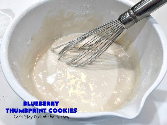 Blueberry Thumbprint Cookies | Can't Stay Out of the Kitchen | these festive & beautiful #Christmas #cookies will have you salivating after the first bite. Perfect for #holiday parties like Christmas & #NewYearsDay. #dessert #blueberries #cookies #HolidayDessert #BlueberryDessert #ChristmasCookieExchange #ChristmasCookie