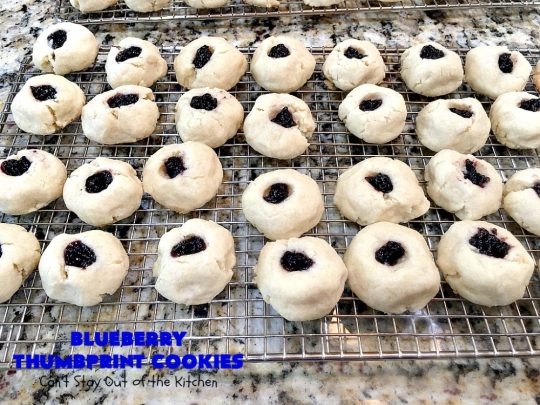 Blueberry Thumbprint Cookies | Can't Stay Out of the Kitchen | these festive & beautiful #Christmas #cookies will have you salivating after the first bite. Perfect for #holiday parties like Christmas & #NewYearsDay. #dessert #blueberries #cookies #HolidayDessert #BlueberryDessert #ChristmasCookieExchange #ChristmasCookie