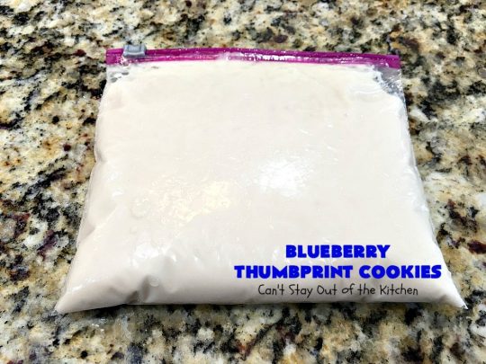Blueberry Thumbprint Cookies | Can't Stay Out of the Kitchen | these festive & beautiful #Christmas #cookies will have you salivating after the first bite. Perfect for #holiday parties like Christmas & #NewYearsDay. #dessert #blueberries #cookies #HolidayDessert #BlueberryDessert #ChristmasCookieExchange #ChristmasCookie