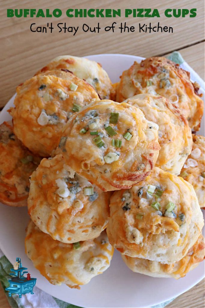 Buffalo Chicken Pizza Cups | Can't Stay Out of the Kitchen | these scrumptious miniature #pizzas include #BuffaloChickenDip in the centers & they're topped with 3 #cheeses including #mozzarella, #TacoCheese & #BlueCheese crumbles. Sensational #appetizer for #holidays, #tailgating parties, potlucks or the #SuperBowl. #BuffaloChicken #chicken #BuffaloChickenPizzaCups