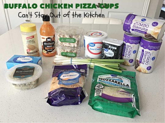 Buffalo Chicken Pizza Cups | Can't Stay Out of the Kitchen | these scrumptious miniature #pizzas include #BuffaloChickenDip in the centers & they're topped with 3 #cheeses including #mozzarella, #TacoCheese & #BlueCheese crumbles. Sensational #appetizer for #holidays, #tailgating parties, potlucks or the #SuperBowl. #BuffaloChicken #chicken #BuffaloChickenPizzaCups